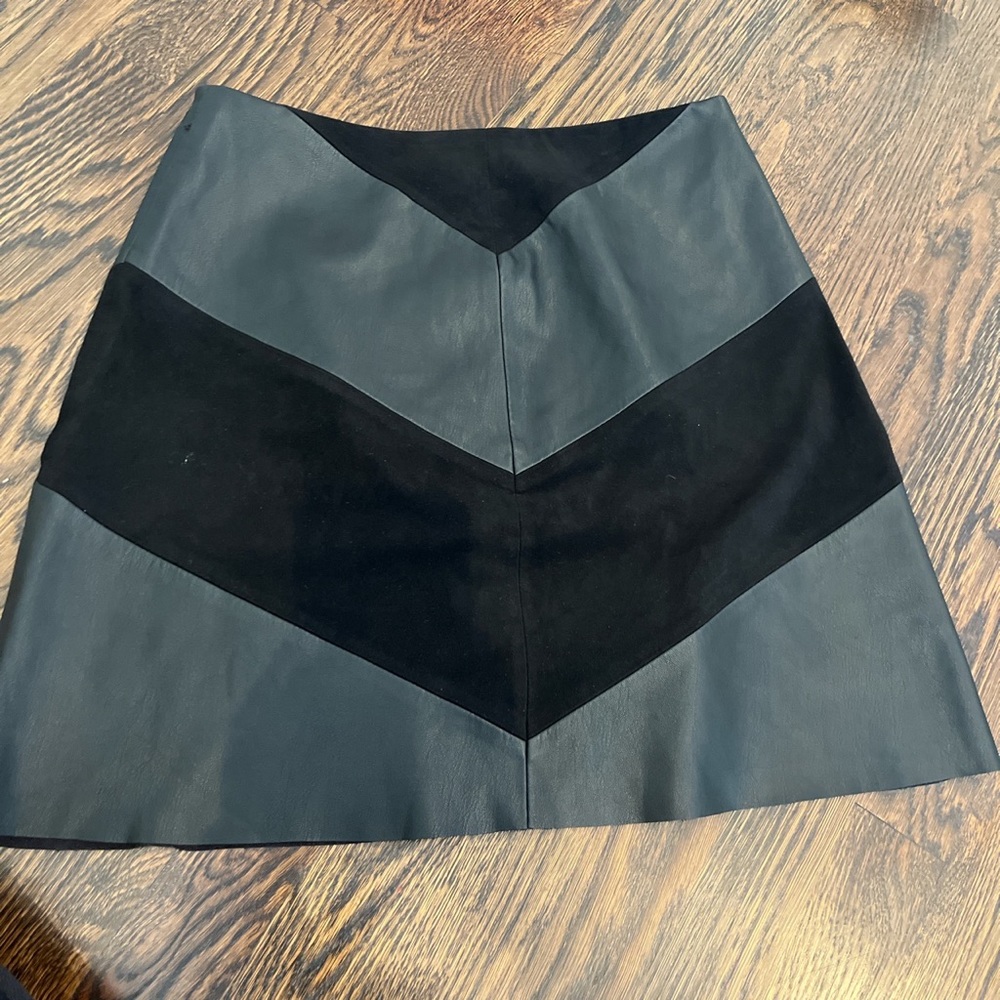 Black suede skirt with faux leather embellishments